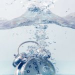 alarm clock in water
