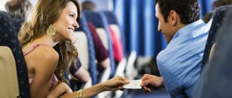 woman meeting man on an airplane
